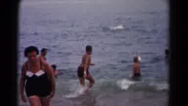 Hagerstown Maryland USA (1961): Several Men Women And Children Play In The Ocean