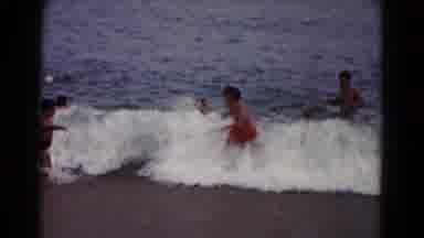 Hagerstown Maryland USA (1961): Group Of People Playing In The Waves Of The Ocean