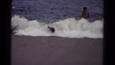 Hagerstown Maryland USA (1961): Young Boy Taken Down By Wave Had Him Tumble Into
