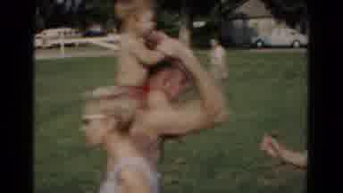 Hagerstown Maryland USA (1961): Man Plays With Young Child On His Shoulders And