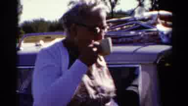 Catskill New York US (1962): The Lady Is Doing Eating In The Outside Of The Road