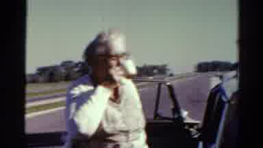 Catskill New York US (1962): Old Woman Drinking Out Of A Cup On Breezy Day