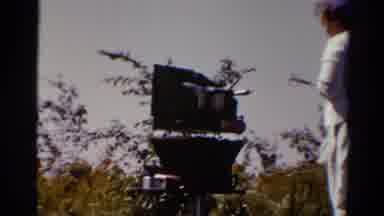 Catskill New York US (1962): Woman Walking Away From A Grill Outside In The