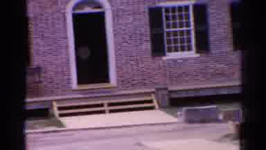 Catskill New York US (1962): Entrance Of A Building With Windows And People