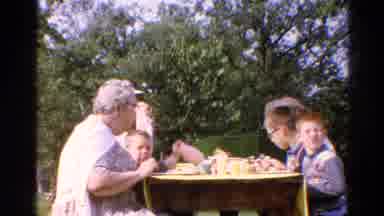 Catskill New York US (1962): A Group Of Elderly And Children All Enjoying Food