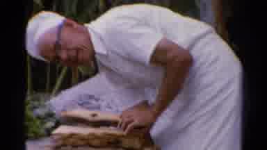 Catskill New York US (1962): A Man Picking Up Wood