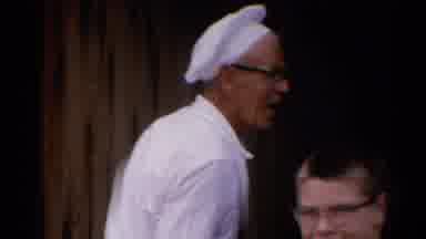 Catskill New York US (1962): Chef Waves Goodbye To Group Of Children With A Smile