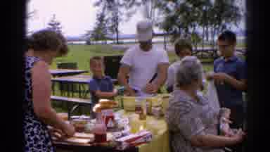 Catskill New York US (1962): Family Having A Meal On A Picnic Bench At A Large