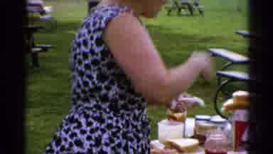 Catskill New York US (1962): Lady Opens A Jar At A Picnic