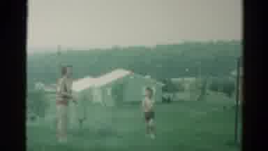 Catskill New York US (1962): Woman In One Piece Bathing Suit Stands On Lawn