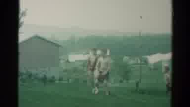 Catskill New York US (1962): Three Kids In Bathing Suits Playing With And Jumping