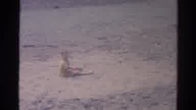 Catskill New York US (1962): Two Young Boys Playing At The Beach One In Sand And