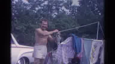 Catskill New York US (1962): The Childrens Are Playing In The Sand And The One Man