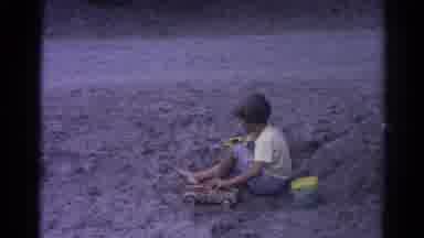 Catskill New York US (1962): The Man That Played In The Sand Is Helping Others Out