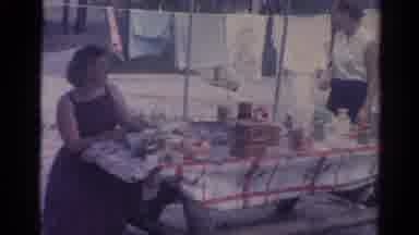 Catskill New York US (1962): Two Women Laying Out Lunch On A Picnic Table Next To