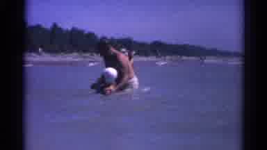 Catskill New York US (1962): Family Plays Wrestles And Dunks Under Water On Nice