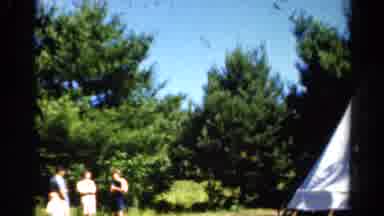 Catskill New York US (1962): Kids Playing While Adults Talk Near Tent In The