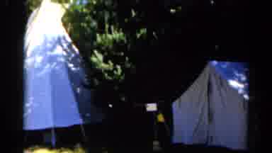 Catskill New York US (1962): Two White Tents Under Trees In A Park With Wind