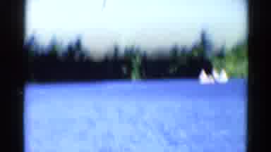 Catskill New York US (1962): People Boating On Blue Lake Surrounded By Lush Trees