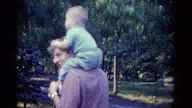 Catskill New York USA (1962): The Father Playing With Baby And Taking Him To The