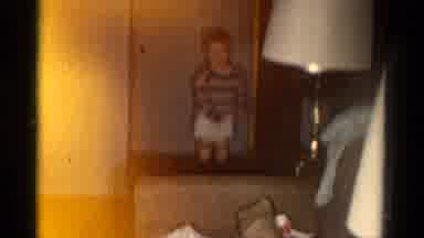 Catskill New York USA (1962): The Little Kid Is Doing To Wear A Trouser With Funny
