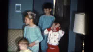 Catskill New York USA (1962): Children Wearing Pajamas Walk Towards Christmas Tree