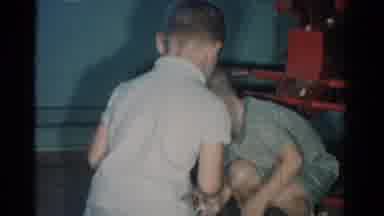 Catskill New York USA (1962): A Group Of Kids Having Fun And Playing London Bridge