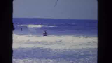 Los Angeles California USA (1962): Two Brave People Swimming In The Medium Waves