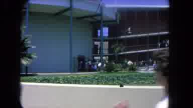 Los Angeles California USA (1962): People Walk Up A Long Ramp At An Outdoor