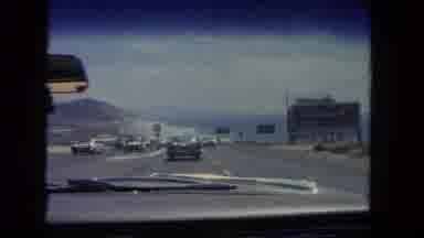 Los Angeles California USA (1962): Passenger Perspective Of Commuting Via Car On