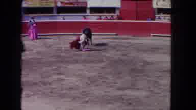 Los Angeles California USA (1962): Matador Intimidates A Bull With A Red Fabric