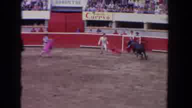 Los Angeles California USA (1962): People Running Around In An Arena With Red