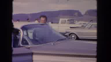 Los Angeles California USA (1962): Video Vintage Guy Looking At Camera Hiding