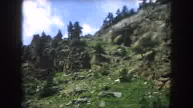Summit County Colorado USA (1962): Lush Hillside Rocky Area With Green Trees