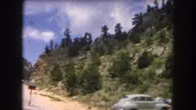 Summit County Colorado USA (1962): Riding Past A Beautiful Mountain Top Admiring