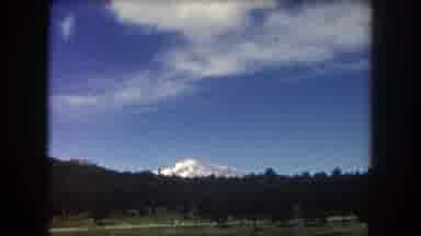 Summit County Colorado USA (1962): Snow Capped Mountain In The Distance Seen From