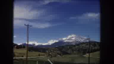 Summit County Colorado USA (1962): Moving Shot Of Large Snow Covered Mountain In