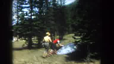 Summit County Colorado USA (1962): Family Dressed In Foreign Outfits Having Fun In