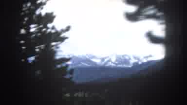 Summit County Colorado USA (1962): Snow Capped Mountain Range In The Distance As