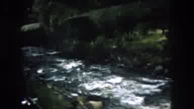 Summit County Colorado USA (1962): Vintage Film Of Car Driving Parallel To A River