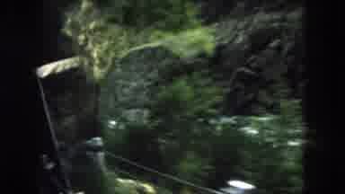 Summit County Colorado USA (1962): Looking Out A Car Window While Driving Through