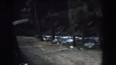 SUMMIT COUNTY COLORADO USA-1962: Driving By A Bridge During The Day And At Night