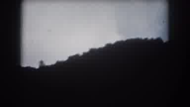 Summit County Colorado USA (1962): View Of Mountain Silhouettes And Setting Sun At