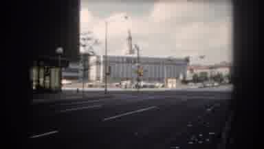Summit County Colorado USA (1962): People In An Unknown City Waiting At A Bus Stop