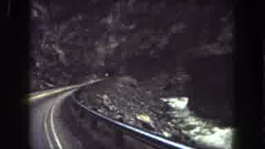 Summit County Colorado USA (1962): Driving On A Two Lane Road To Drive Through A
