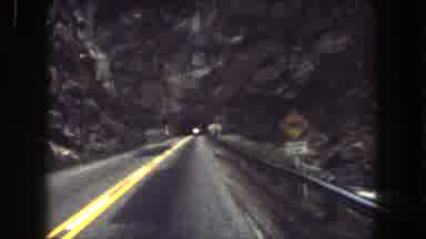 Summit County Colorado USA (1962): Driving On A Road With Lights From Oncoming