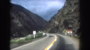 Summit County Colorado USA (1962): Moving Scene Of A Two Lane Mountain Road Taken