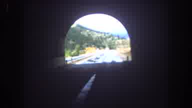 Summit County Colorado USA (1962): Vintage Car Ride Through A Tunnel Leading To