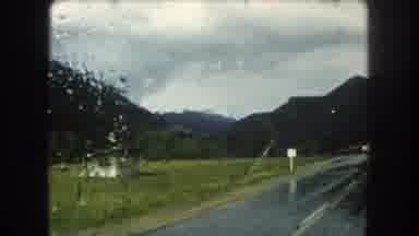 Summit County Colorado USA (1962): Driving On The Mountain Side While Raining