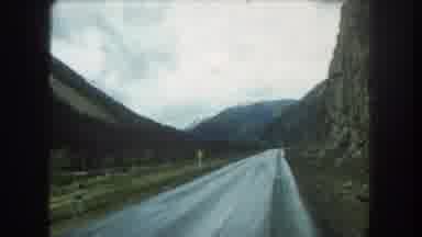Summit County Colorado USA (1962): Driving Down A Mountain Road